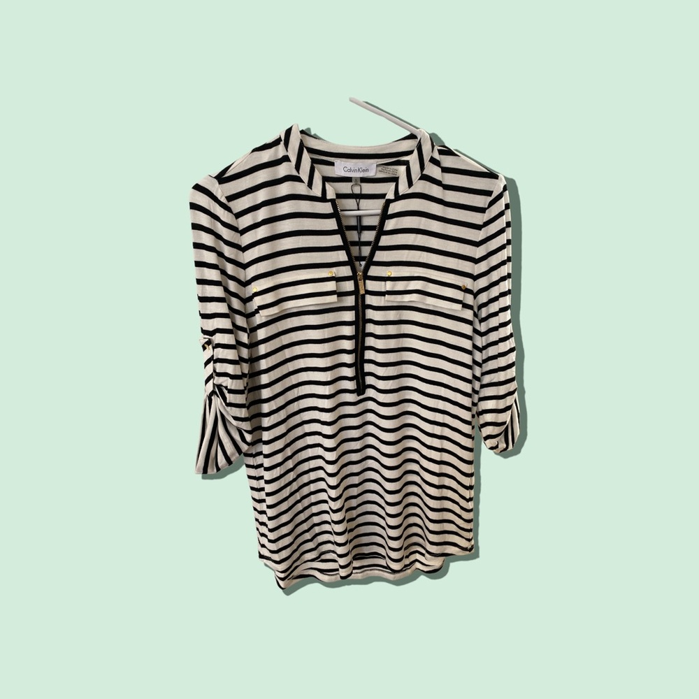 Women’s Calvin Klein blouse. New with tags. Black and white. Size S.